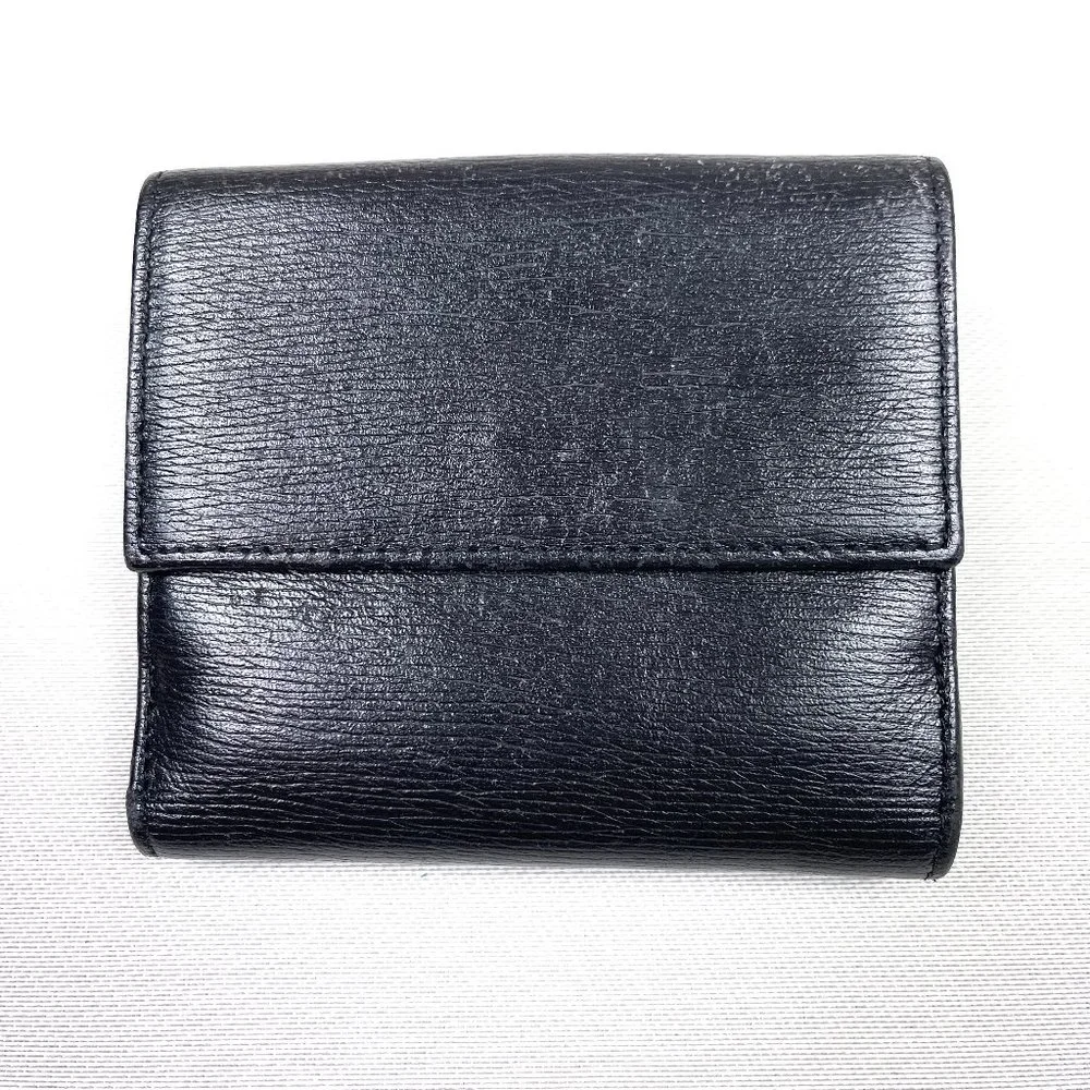 Auc Gucci Snappy Bi-fold GG vintage leather wallet